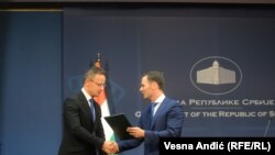 Ministar finansija Srbije Siniša Mali i ministar spoljnih poslova i trgovine Mađarske Peter Sijarto, Beograd, 10. jun 2022. 