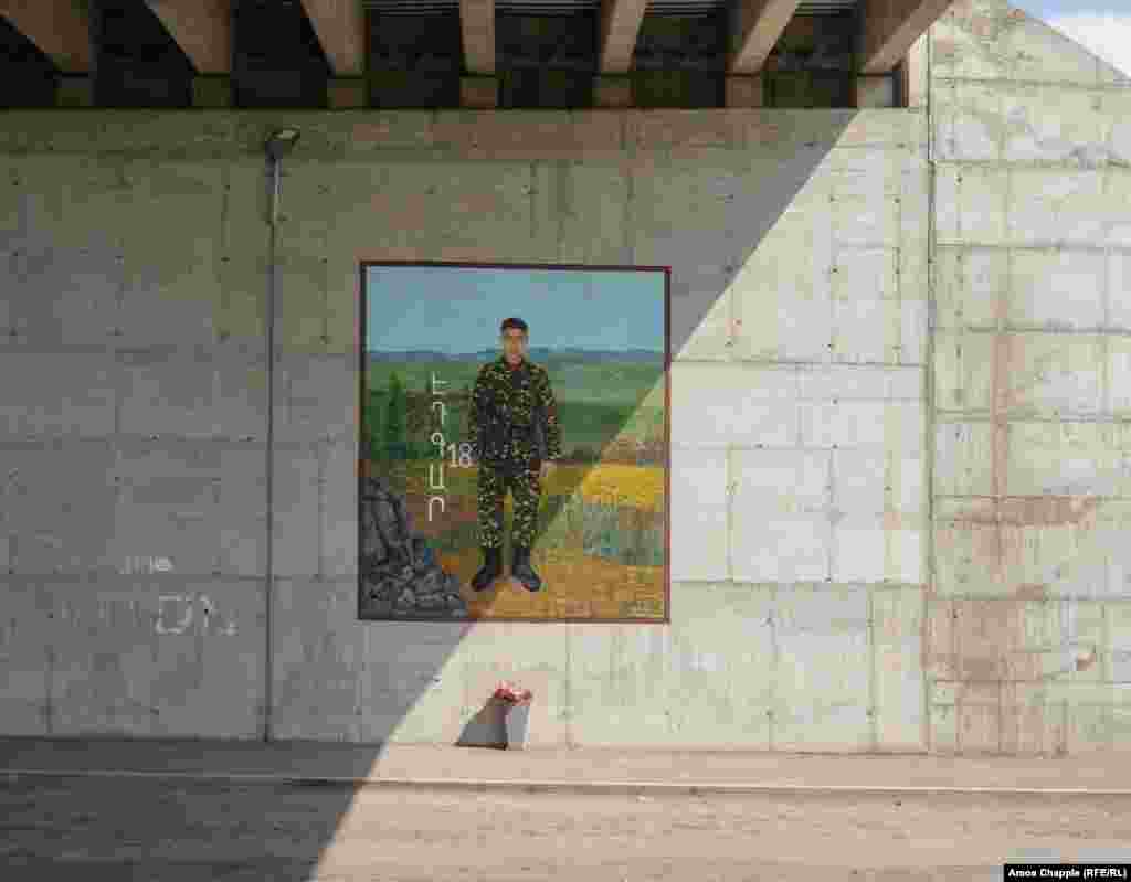 A mural under a highway bridge in southern Yerevan in memory of Edgar, 18. A local told RFE/RL that the imagery is &quot;an absolutely new tradition&quot; to honor Armenians killed in battle.&nbsp; &nbsp;