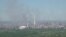 Black smoke billows over the Azot chemical plant in Syevyerodonetsk in this still image obtained from a handout video released on June 9. 
