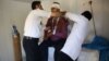 A man injured in the earthquake is treated at a local hospital.