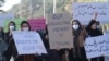 Afghan women attend a rally to mark International Women's Day in Herat on March 8.