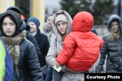 Беженцы из Мариуполя в России