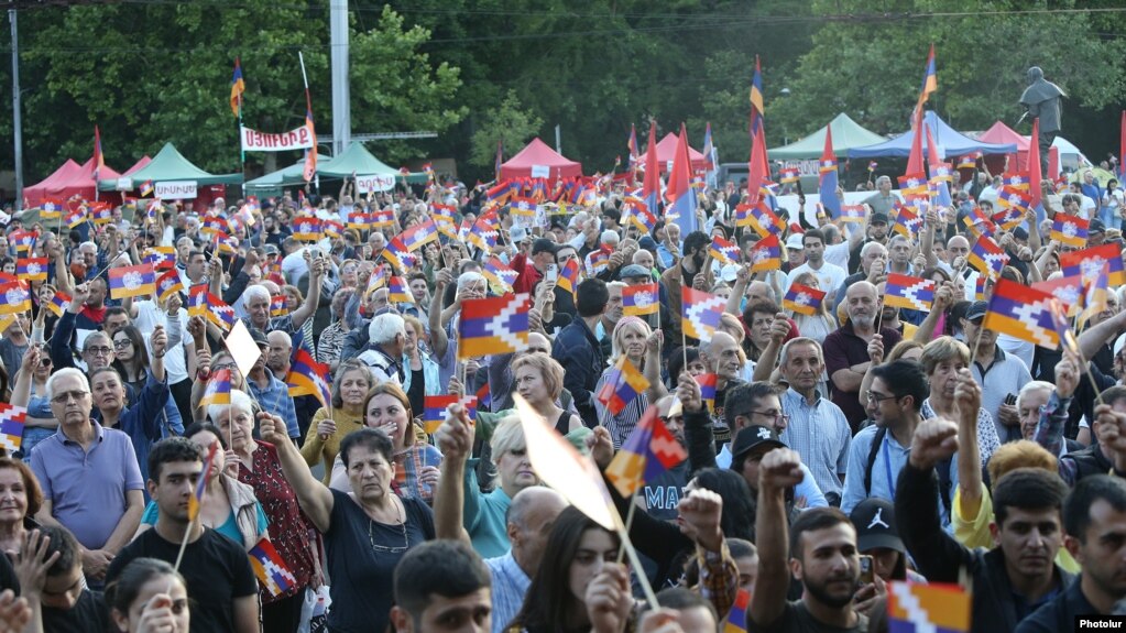 Armenia's opposition stages a protest in Yerevan's French Square on June 14.