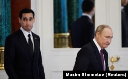 Russian President Vladimir Putin (right) meets with Serdar Berdymukhammedov in Moscow in June.