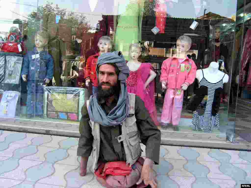 Afghanistan -- Afghan disable begs on a road side in Kabul Afghanistan October 4, 2009 - Afghanistan -- Afghan disable begs on a road side in Kabul Afghanistan October 4, 2009