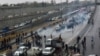 People protesting higher gas prices and government policies on a highway in Tehran, Iran November 16, 2019. 