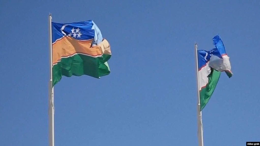 The flags of Uzbekistan (right) and Karakalpakstan (file photo)