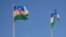 The flags of Uzbekistan (right) and Karakalpakstan (file photo)