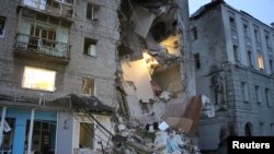 Shkatërrimi i ndërtesave nga bombardimet e forcave ruse në Harkiv.