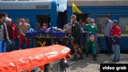 „Trenul vieții”: Medici fără Frontiere transportă răniți de pe linia frontului, din estul Ucrainei, iunie 2022.