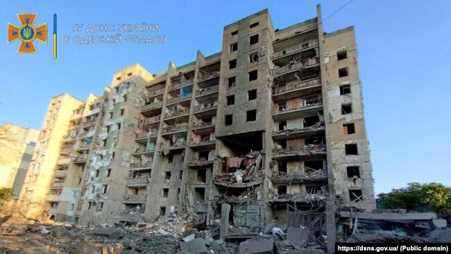 A handout picture from local authorities showing the aftermath of a missile strike on a residential building in Ukraine's Odesa region, on the morning of July 1. 