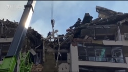 Ukrainian Firefighters Rescue Residents, Clear Rubble As Russian Missiles Hit Housing Area