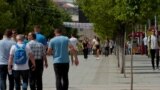 People are walking on a street in Pristina_Kosovo