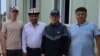 Aidarbek Khaidarov (second from right) told RFE/RL on July 10 that he and 10 other Kyrgyz nationals who had been detained at different times since last year were released in recent days.