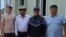Aidarbek Khaidarov (second from right) told RFE/RL on July 10 that he and 10 other Kyrgyz nationals who had been detained at different times since last year were released in recent days.