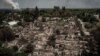 An aerial view shows destroyed houses after a Russian strike in the town of Pryvillya in the eastern Ukrainian region of Donbas on June 14.