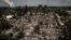 An aerial view shows destroyed houses after a Russian strike in the town of Pryvillya in the eastern Ukrainian region of Donbas on June 14.