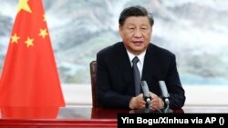 Председатель Китая Си Цзиньпин выступает с основным докладом на открытии виртуального саммита БРИКС. 22 июня 2022 года
