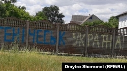 Надпись на заборе в оккупированном Геническе, июнь 2022 года