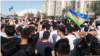 Demonstrators in Nukus "had only flags in their hands. They were just chanting, clapping, cheering," one bystander said.