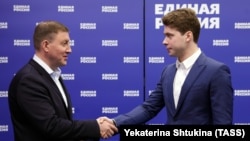 Секретарь генерального совета партии "Единая Россия" Андрей Турчак (слева) и сын Дмитрия Медведева Илья Медведев