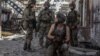 Ukrainian soldiers in an industrial area of the city of Syevyerodonetsk on June 20.