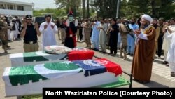 The attacks on the scholars are the latest in a wave of targeted attacks in North Waziristan. Late last month, two police officers were killed in militant attacks in the region (their funeral in Miran Shah on June 28, pictured above). 