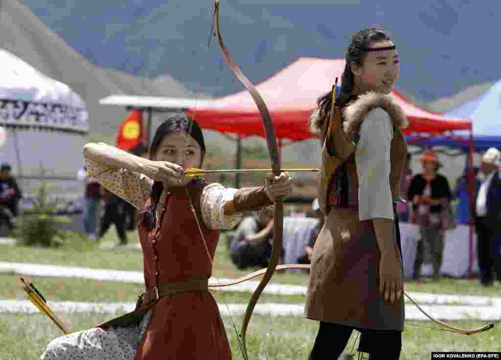 Kyrgyz girls showcase their archery skills.