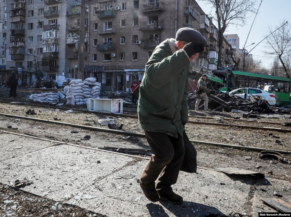 A heavily damaged street corner in Kyiv after an apparent missile explosion on March 13.