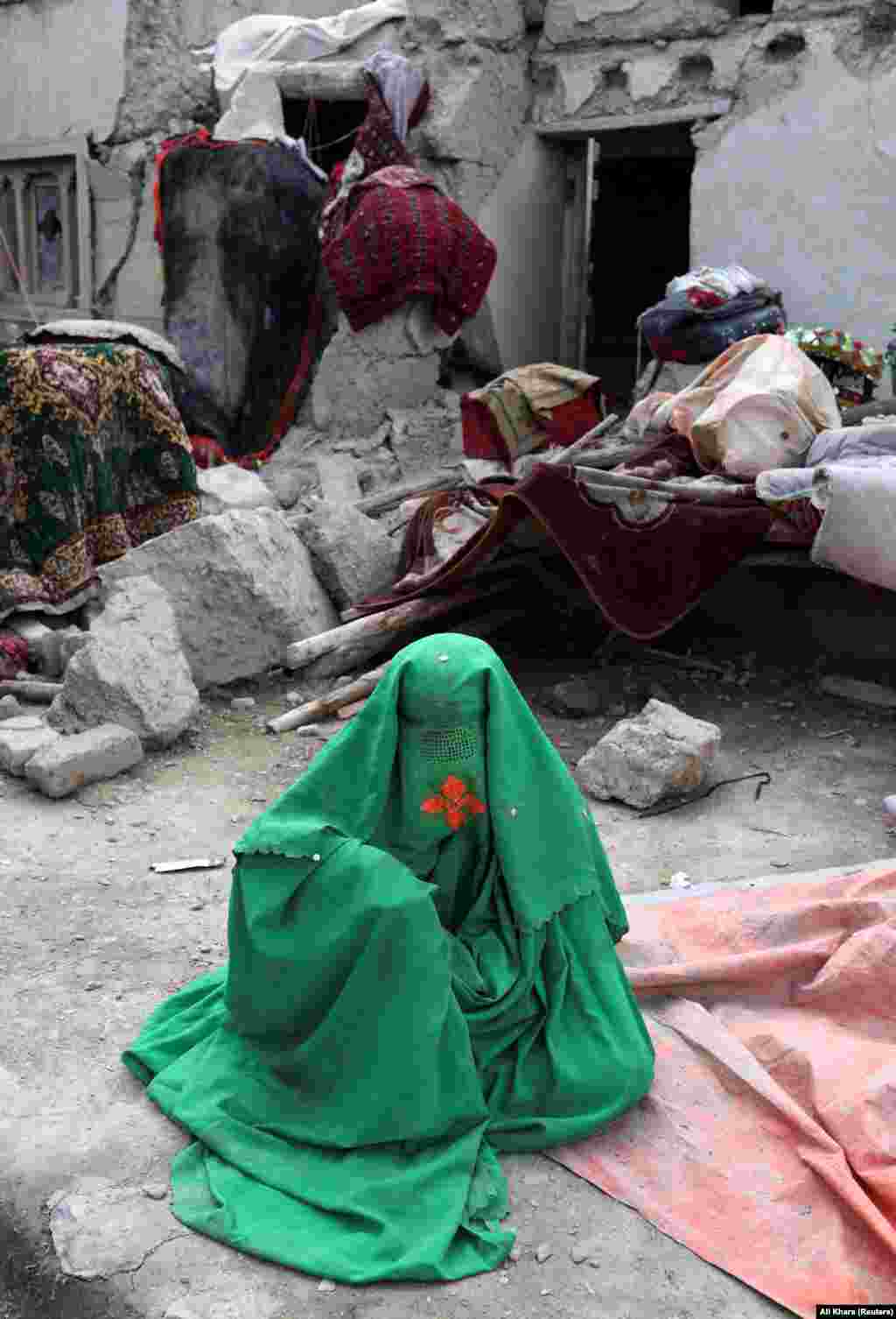 An injured Afghan woman waits for treatment. Taliban officials have stated that the country lacks medical supplies to treat the injured and they have requested humanitarian assistance from the international community. The 6.1 magnitude earthquake struck about 160 kilometers&nbsp; southeast of Kabul, near the Pakistani border, in an arid mountain region dotted with small settlements that has been frequently contested during decades of war in Afghanistan.&nbsp;The Paktika and Khost provinces were worst hit.