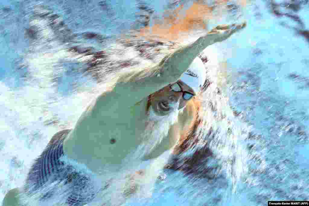 Ukraine&#39;s Mykhailo Romanchuk competes in a heat for the men&#39;s 800-meter freestyle event during the Budapest 2022 World Aquatics Championships at Duna Arena in Budapest on June 20.