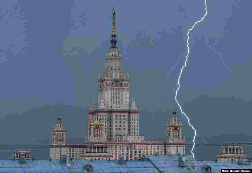A lightning bolt strikes near Moscow State University during a thunderstorm.