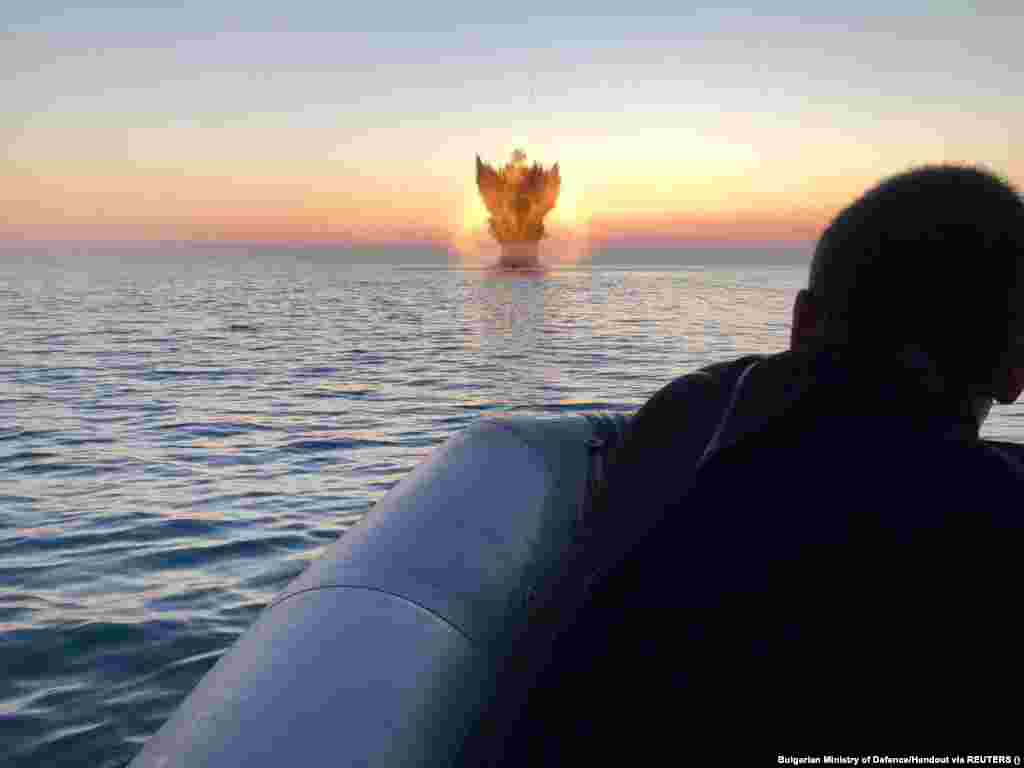 Bulgarian Navy personnel destroy a mine in the Black Sea on July 1.&nbsp;