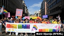 People take part in Sarajevo's third Pride Parade on June 25, 2022.