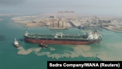 An oil tanker is seen off the coast of Bushehr, Iran, in June. 