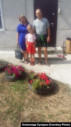 Александр Сухарев с семьей