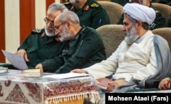 Mohammad Kazemi (center) has replaced Hossein Taeb (right) as head of intelligence.