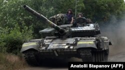 Ілюстраційне фото. Українські військові на дорозі Луганської області, 23 червня 2022 року