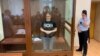 Lilia Chanysheva, pictured at the Basman court in Moscow on July 7, may face up to 18 years in prison if convicted on charges of extremism and taking part in an extremist organization's activities.