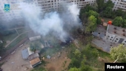 Последствия российского обстрела жилых домов в Харькове, 14 мая 2024 года