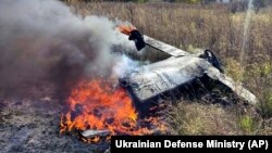 საილუსტრაციო ფოტო. უკრაინის საჰაერო თავდაცვის სისტემის მიერ ჩამოგდებული რუსული რაკეტის ნაწილი