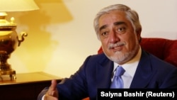 Abdullah Abdullah speaks during an interview in Islamabad on September 30.