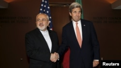 A year later, would Iranian Foreign Minister Mohammad Javad Zarif (left, with U.S. Secretary of State John Kerry at the United Nations in New York in April) still call it a "win-win" deal?