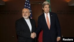 A year later, would Iranian Foreign Minister Mohammad Javad Zarif (left, with U.S. Secretary of State John Kerry at the United Nations in New York in April) still call it a "win-win" deal?