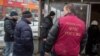 Russia -- Federal Migration Service officers raid illegal immigrants near a metro station in Moscow, January 4, 2015