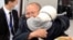Kazakhstan - Rakyzhan Zeinolla hugged his daughter after 17 years of separation. Almaty, 9 April 2021