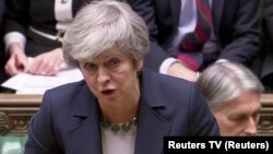 Премьер-министр Великобритании Тереза Мэй в парламенте, 13 марта 2019 год