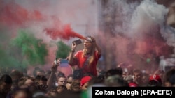 Hungarian fans march toward Puskas Arena before the match in Budapest on June 15.