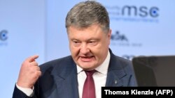 In his Munich address, Ukrainian President Petro Poroshenko accused Russia of deploying disinformation as part of a "world hybrid war."
