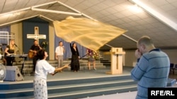 Worshippers at the New Life Church in Minsk